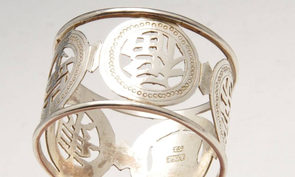 A cased set of six Chinese export napkin rings, each of circular openwork form with a band of - Image 3 of 4
