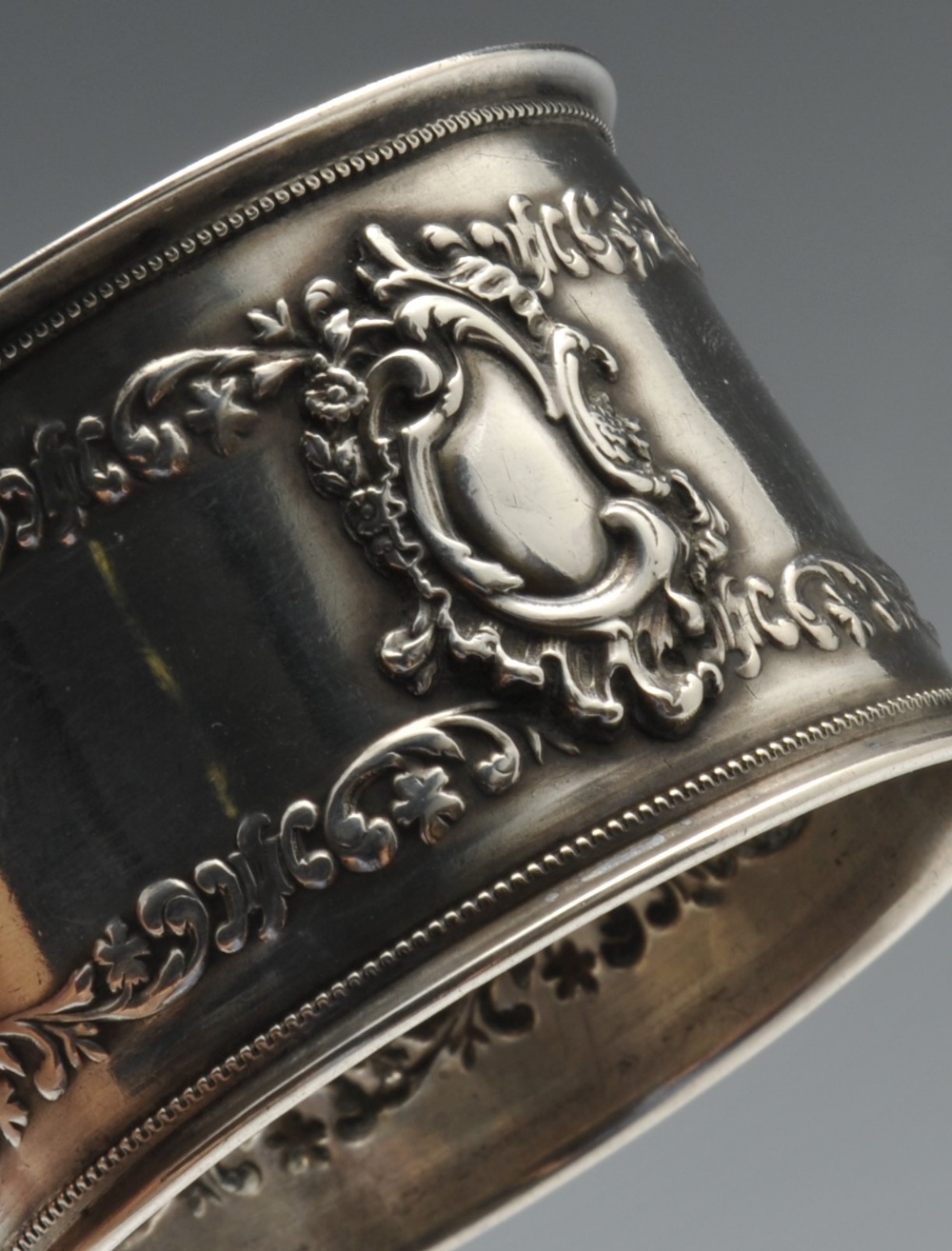 A pair of small German silver cream jugs with embossed panelled decoration, German assay marks for - Image 8 of 9