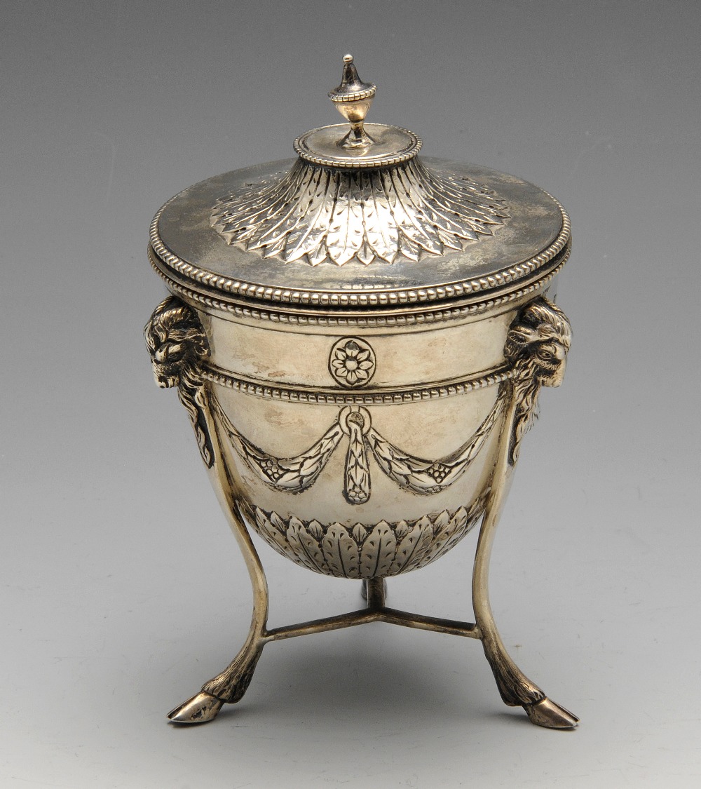A late Victorian Neoclassical cup and cover, the conical body with swag embossing and raised on a
