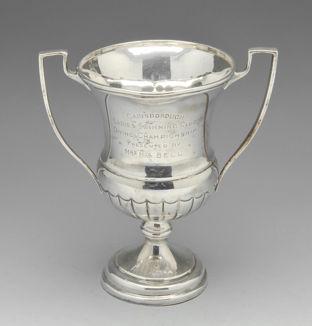 A 1920's silver twin-handled trophy cup, of campana form with presentation engraving to one side,