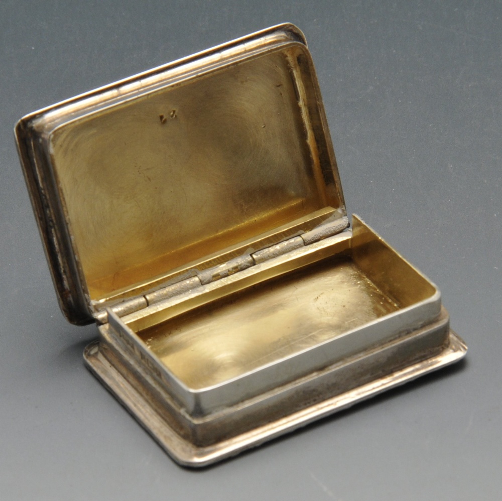 A 1970's silver castle top snuff or pill box, the hinged cover opening to reveal a gilt interior. - Image 2 of 5