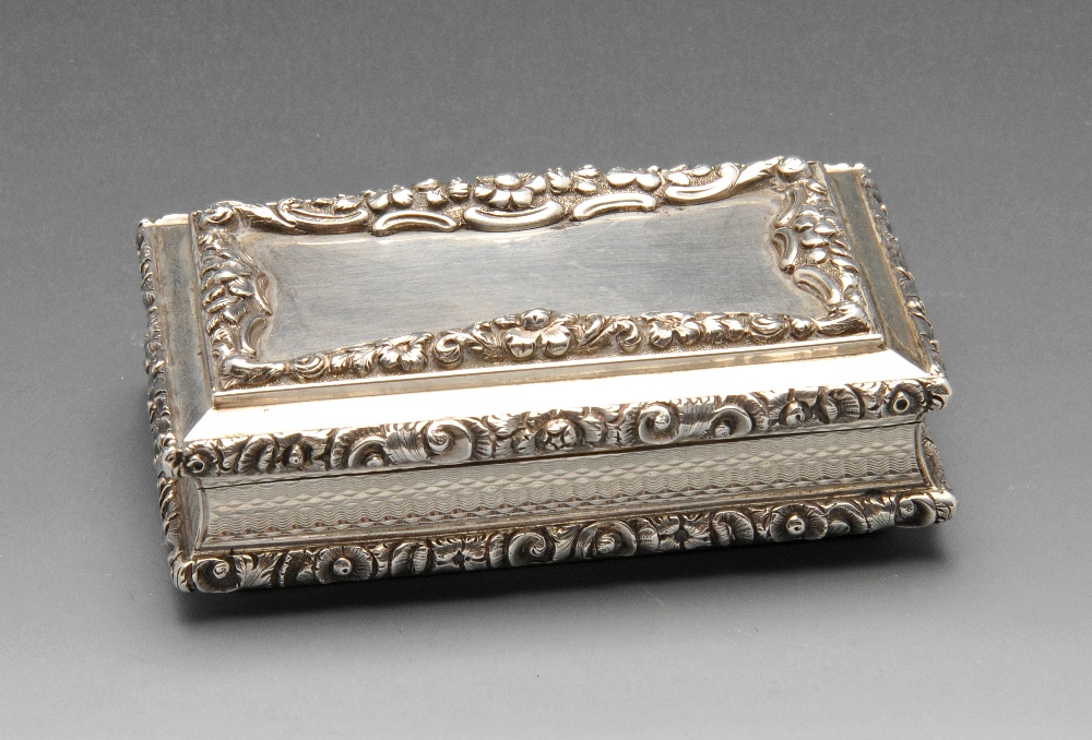 An early Victorian silver snuff box by Nathaniel Mills, the oblong form with engine-turned