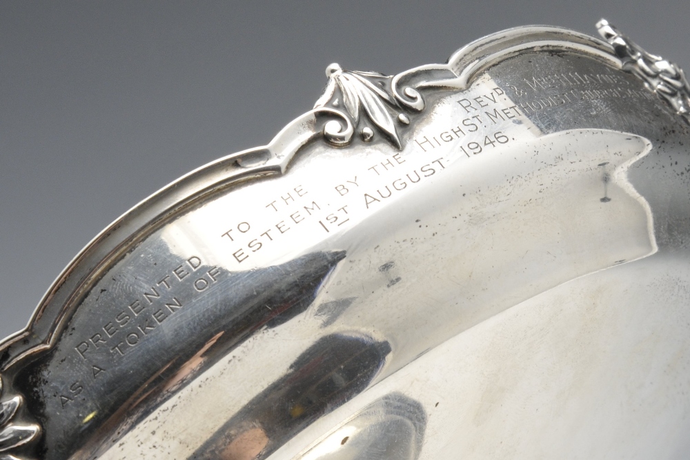 A 1930's silver pedestal dish of circular form, applied foliate, shell and scroll rim with a later - Image 5 of 7