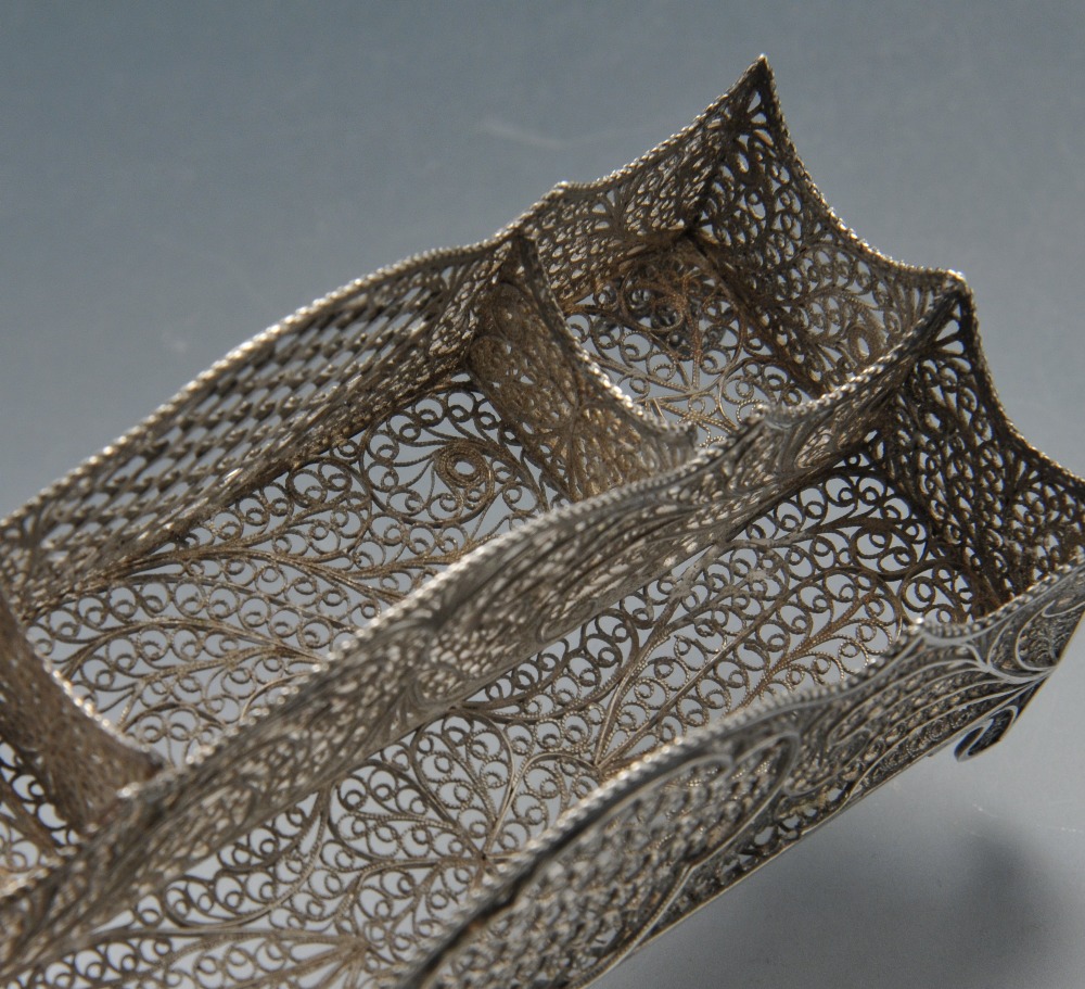 A continental small filigree inkstand, modelled in the style of a letter rack on four corner bracket - Image 5 of 5