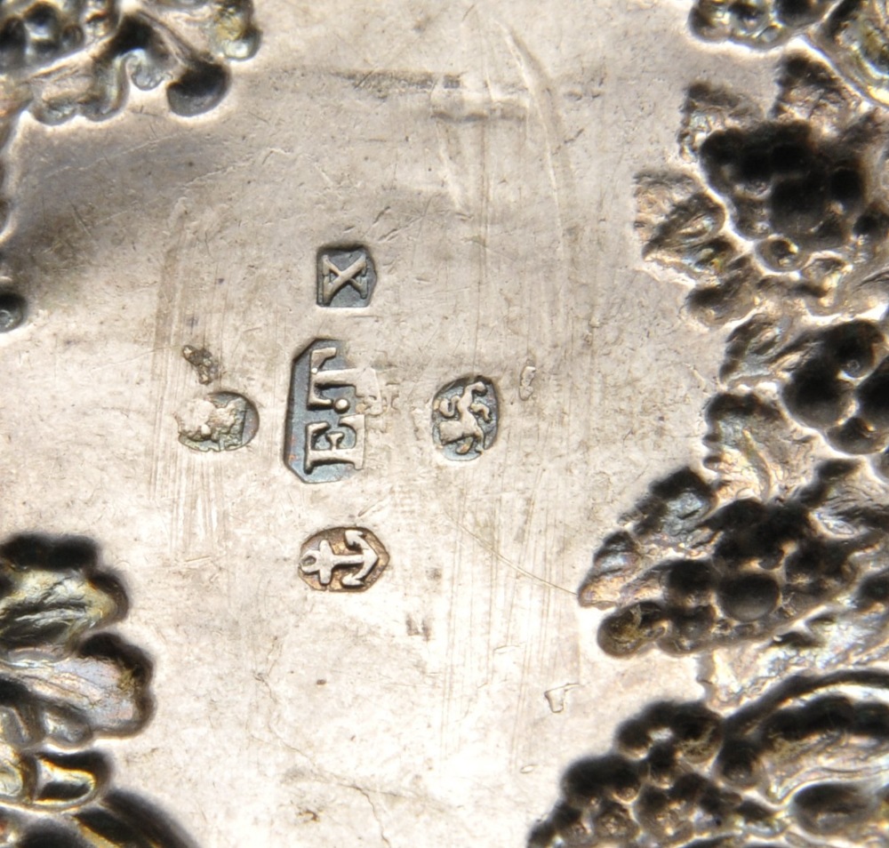 A George IV silver wine label, the scalloped scroll surround with fruiting vine, surmounted with - Image 2 of 3