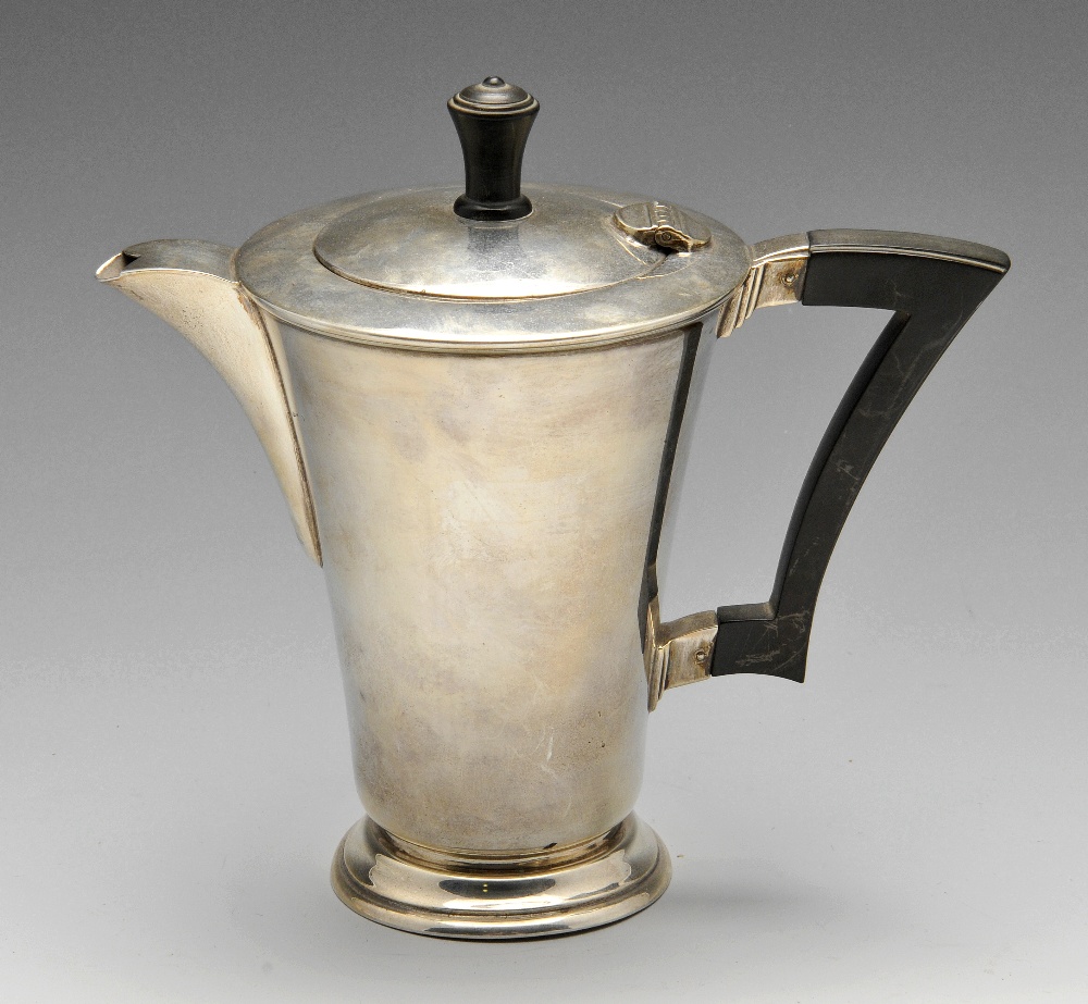 A 1940's silver hot water pot, of trumpet form having angular hardwood handle and raised upon a