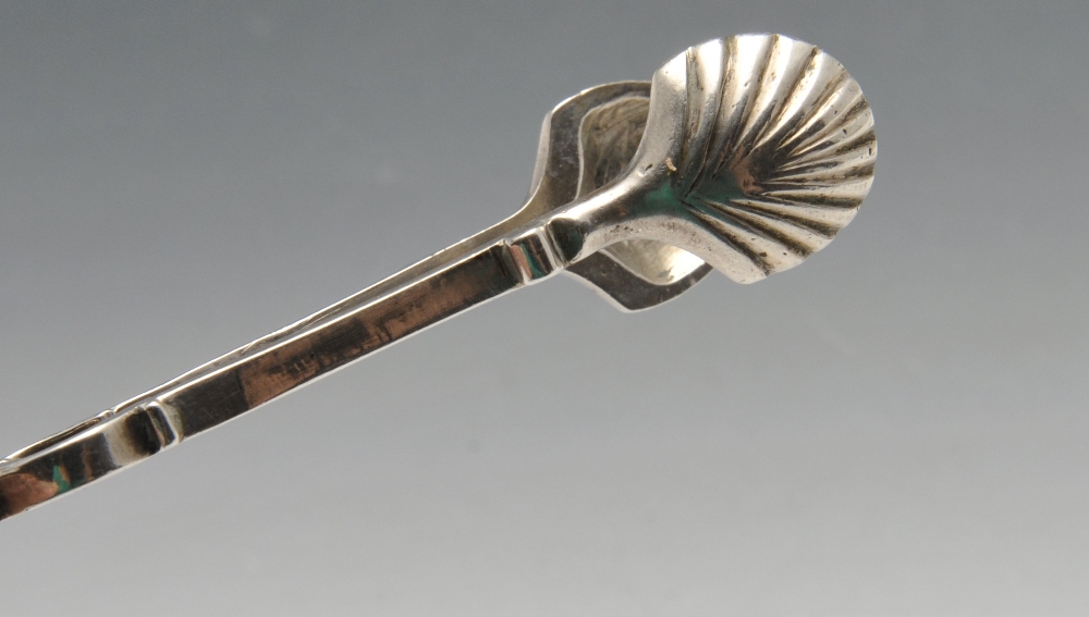 Two similar pairs of Georgian silver scissor sugar tongs, each with scroll arms with shell bowls and - Image 3 of 5