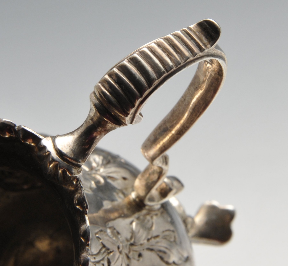 A George III silver cream jug, the bellied form with oblique fluting and beading amidst floral - Image 5 of 5