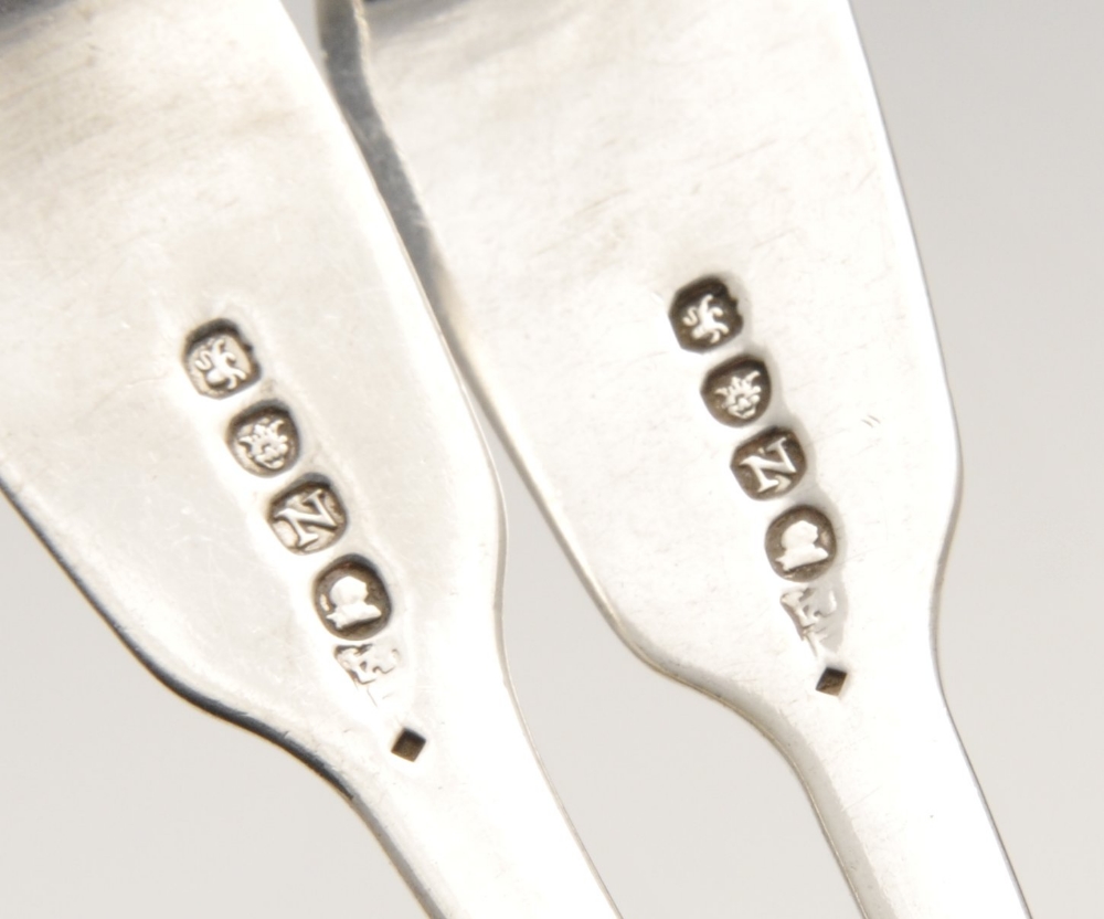 A pair of George III silver sauce ladles, in Fiddle pattern with engraved monograms to terminals. - Image 2 of 6