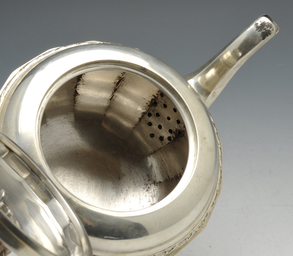 An early twentieth century silver three piece tea service, comprising teapot, milk jug and twin- - Image 7 of 11