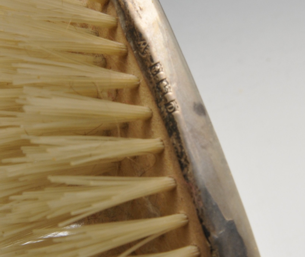 A mid-twentieth century silver mounted dressing table set comprising, hand mirror, two hair - Image 5 of 8