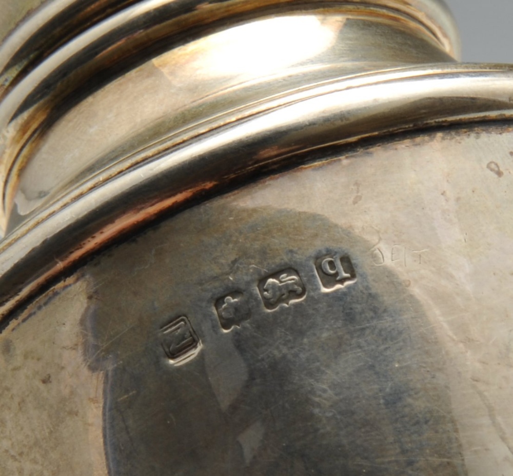 An early twentieth century silver caster of urn form, hallmarked Birmingham 1915, height measuring 6 - Image 2 of 8