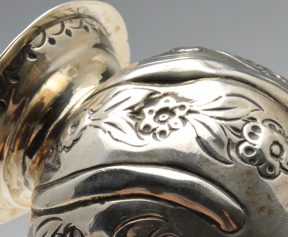 A George III silver cream jug, the bellied form with oblique and floral embossing and sparrow - Image 4 of 12