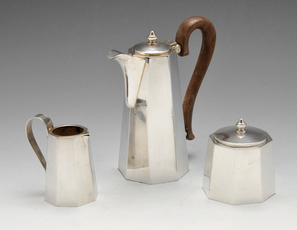 A modern Italian silver bachelor coffee set comprising coffee pot, lidded sugar bowl and cream