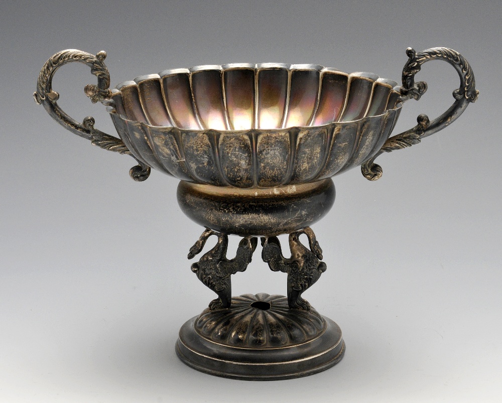 A Spanish silver tazza, the fluted bowl with twin scrolling handles, raised on griffin style