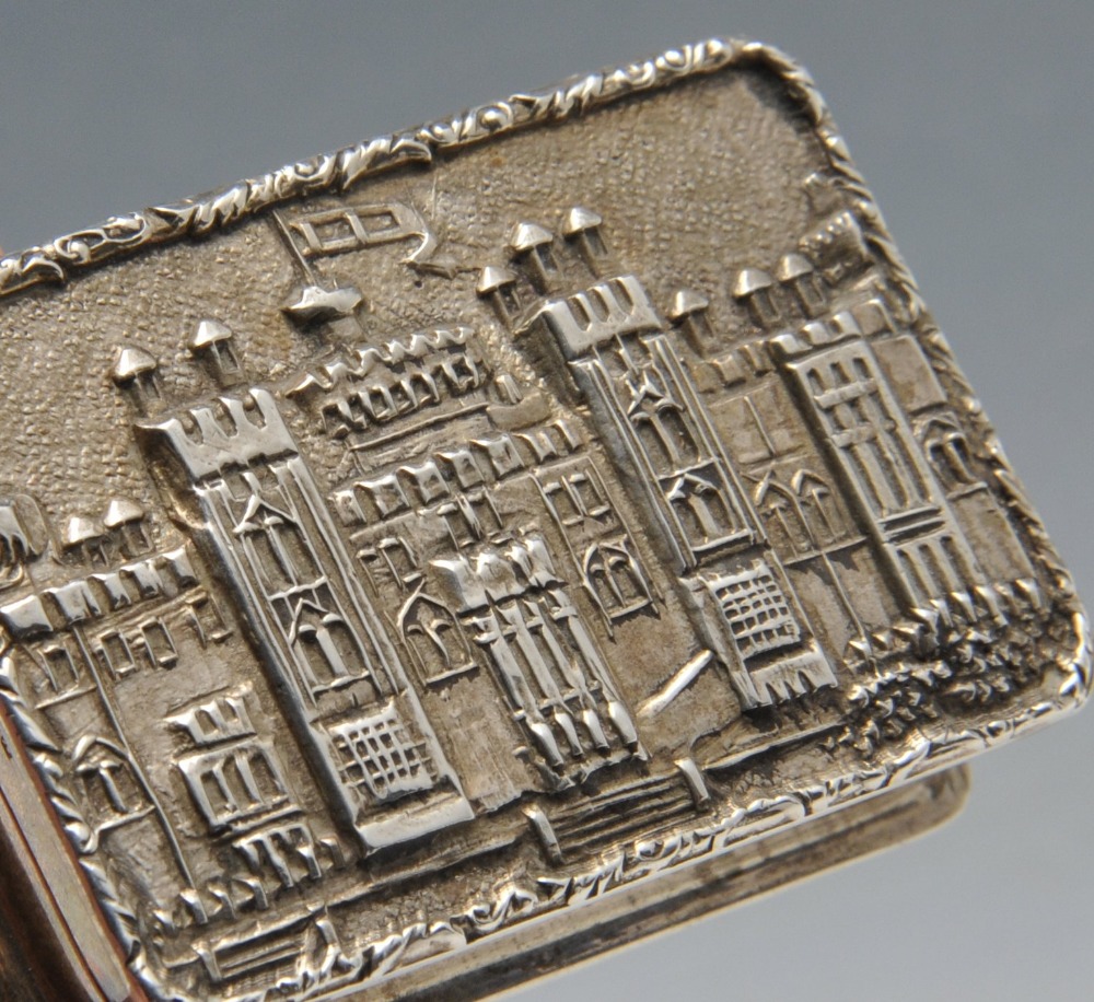 A 1970's silver castle top snuff or pill box, the hinged cover opening to reveal a gilt interior. - Image 4 of 5