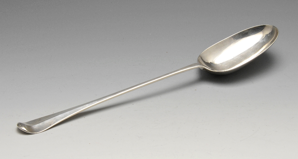 A George I silver Hanoverian basting spoon. Hallmarked James Wilks, London 1726. Length measuring 12