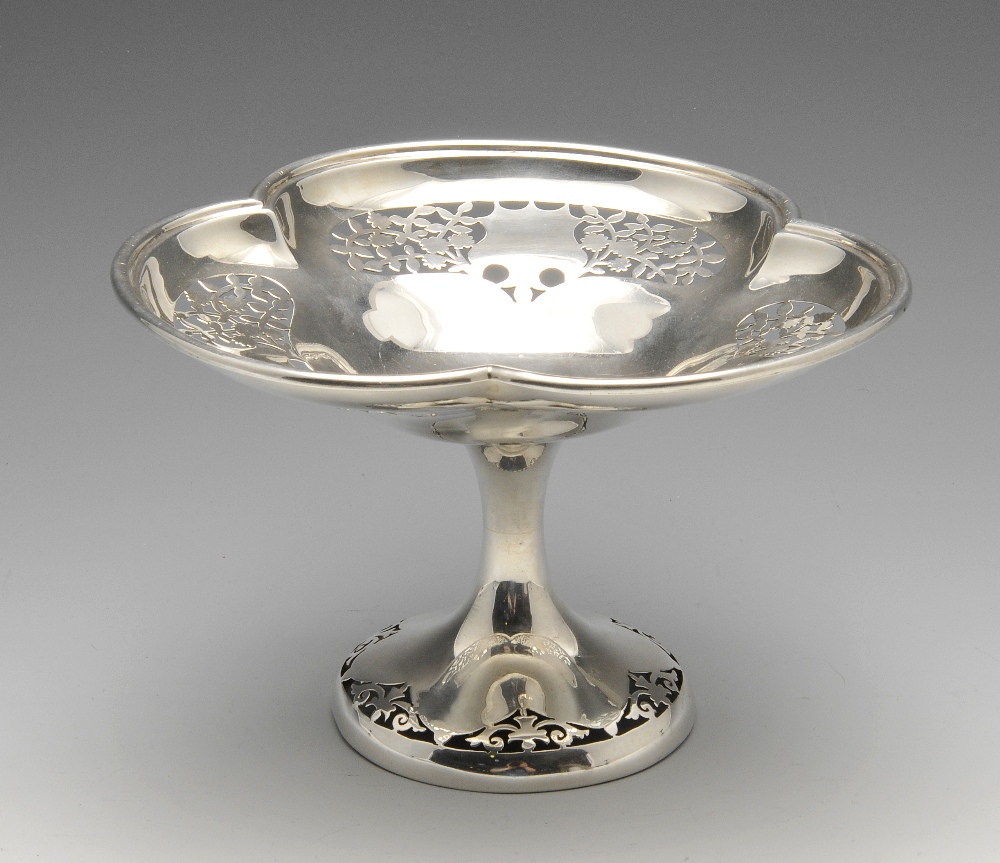 An Edwardian silver tazza, the trefoil pierced bowl on pedestal circular base conforming in