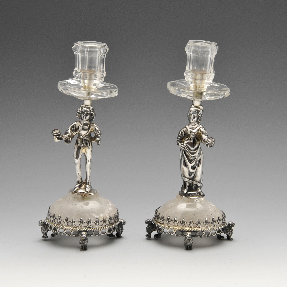 A pair of silver import mounted rock crystal candlesticks, each with figural stem modelled as a lady