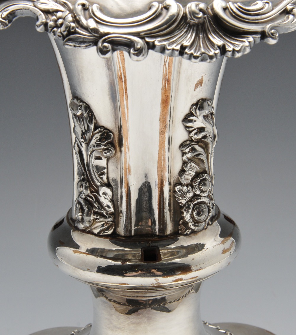 A plated epergne or table centrepiece decorated throughout with applied borders of floral and scroll - Image 3 of 5