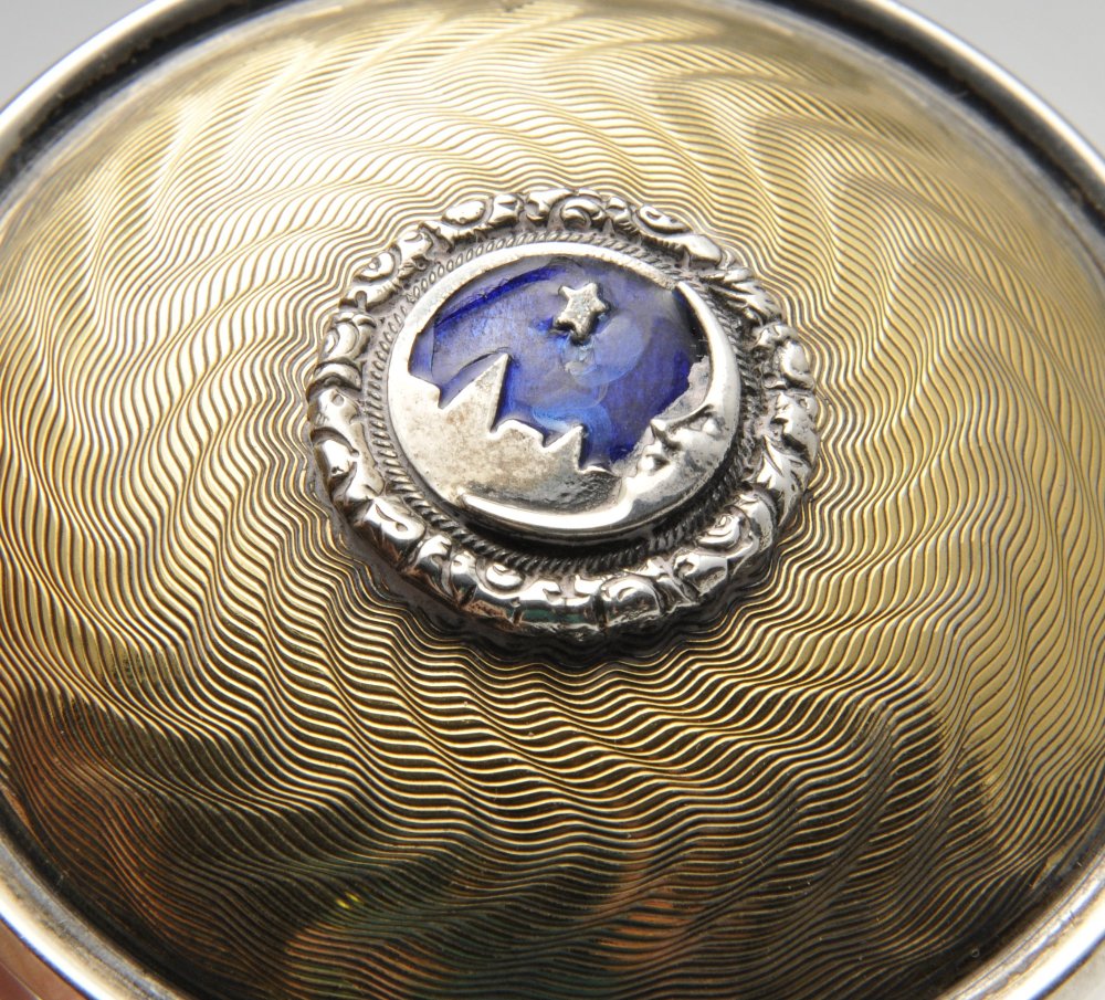 A modern silver musical jewellery or trinket box, the cylindrical with silver-gilt engine-turned - Image 5 of 9