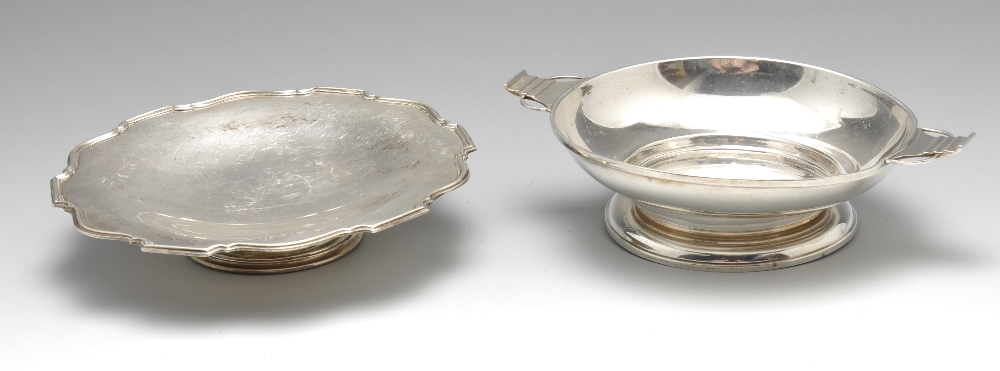A 1930's silver twin-handled footed dish of plain circular form, hallmarked Adie Brothers Ltd.,