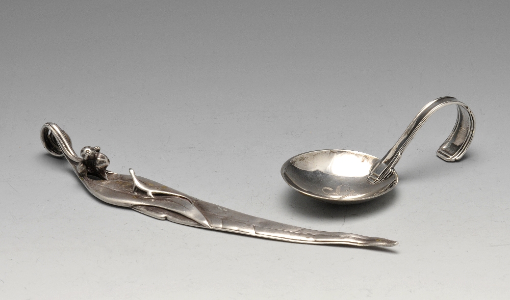 A mid-twentieth century Italian silver caddy spoon with initial engraved oval bowl and simple curved