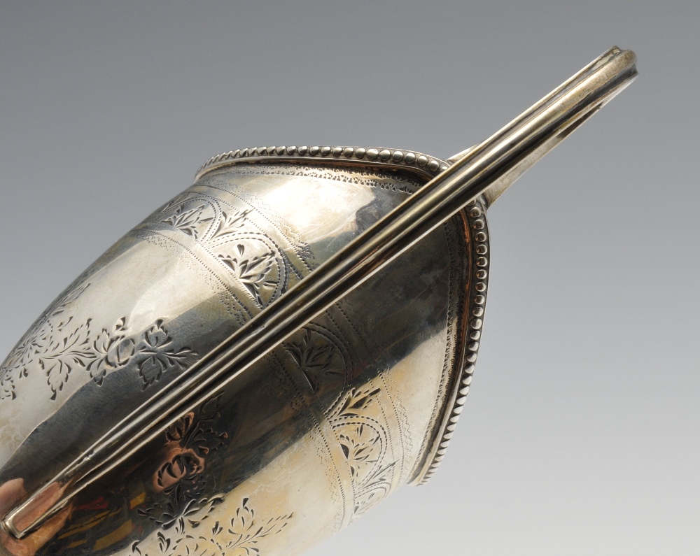 A George III silver helmet jug, the classic form with engraved floral and foliate borders, - Image 5 of 5