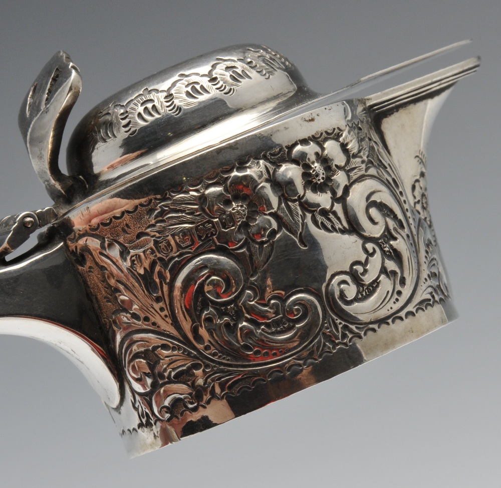 A George IV silver christening mug decorated with embossed floral and foliate panels and having a - Image 8 of 10