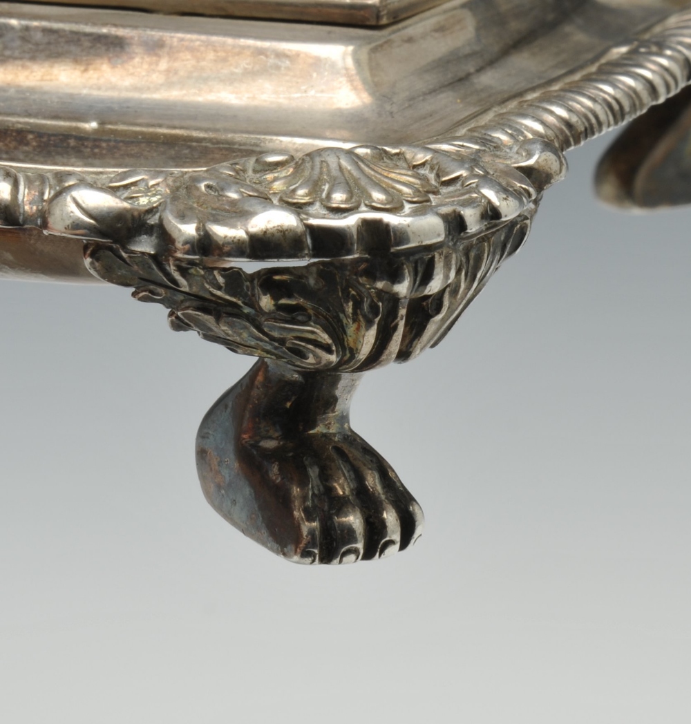 A George III silver desk stand of oblong form, having a gadroon rim with foliate shell borders and - Image 6 of 9