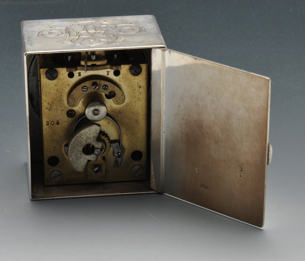 A French silver cased bedside clock, the white enamel dial signed Tiffany Paris, with black Roman - Image 5 of 5