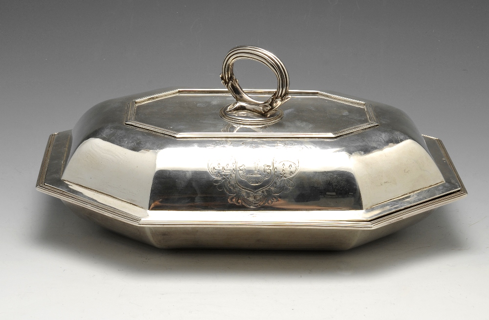 A George III silver entree dish and cover of octagonal sided form with reeded borders, the cover
