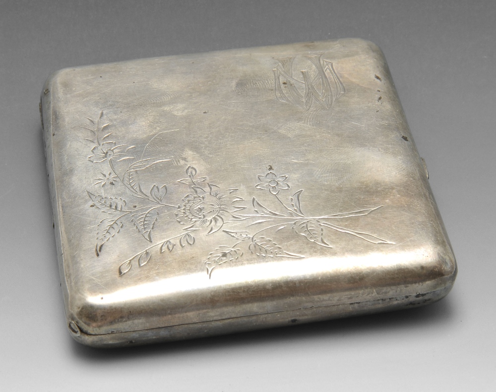 A late nineteenth century Russian silver cigarette case, the oblong form florally engraved with