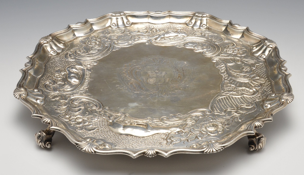 A suite of George II matched salvers, comprising a similar pair and third larger example, each of - Image 4 of 15