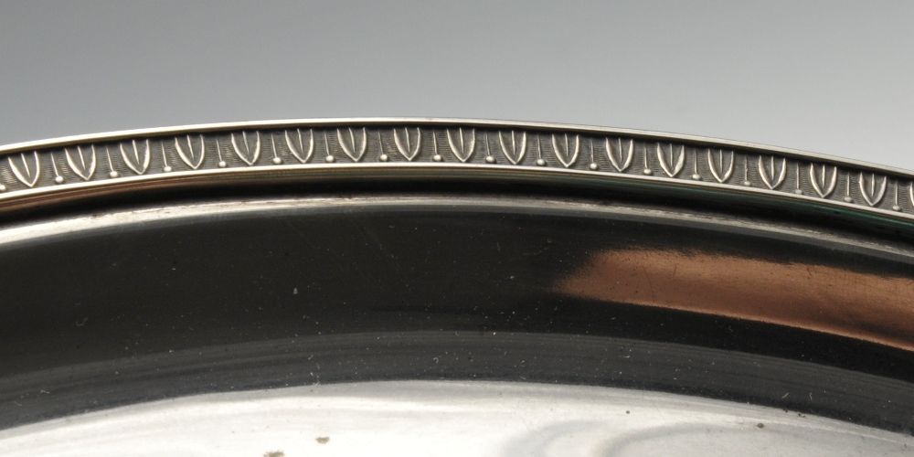 A large Italian silver tray, of plain circular form having formal leaf border to rim. Marked 800 - Image 2 of 2