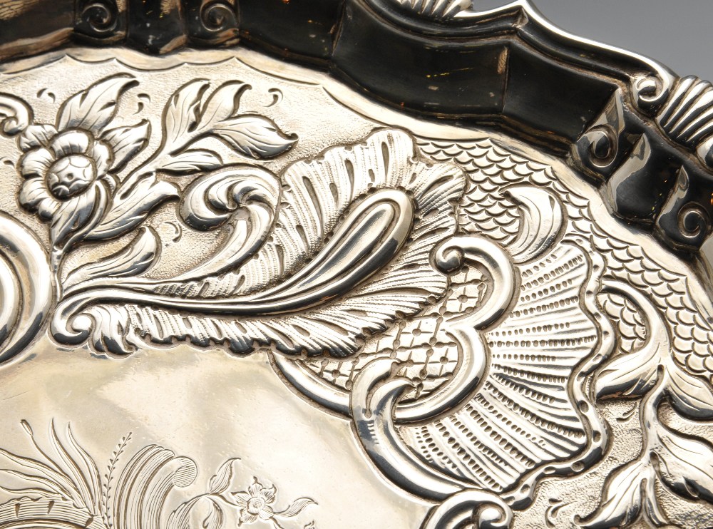 A suite of George II matched salvers, comprising a similar pair and third larger example, each of - Image 12 of 15