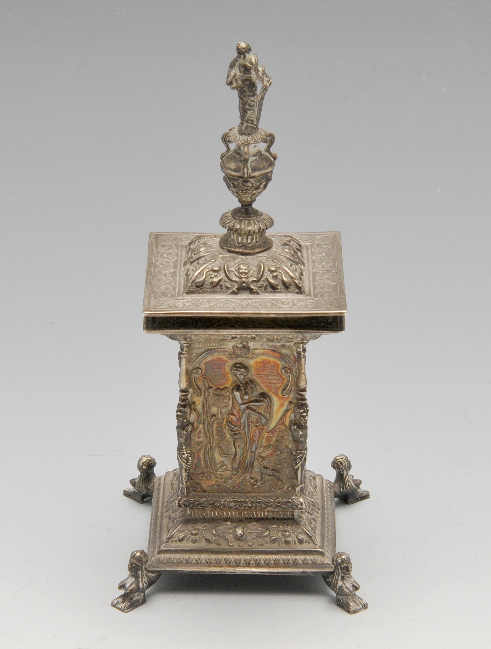 An early twentieth century silver inkwell, the Neoclassical column form embellished with stylised