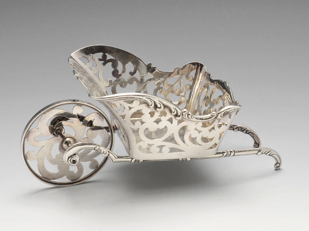 A twentieth century Dutch novelty silver basket, realistically modelled as wheelbarrow with