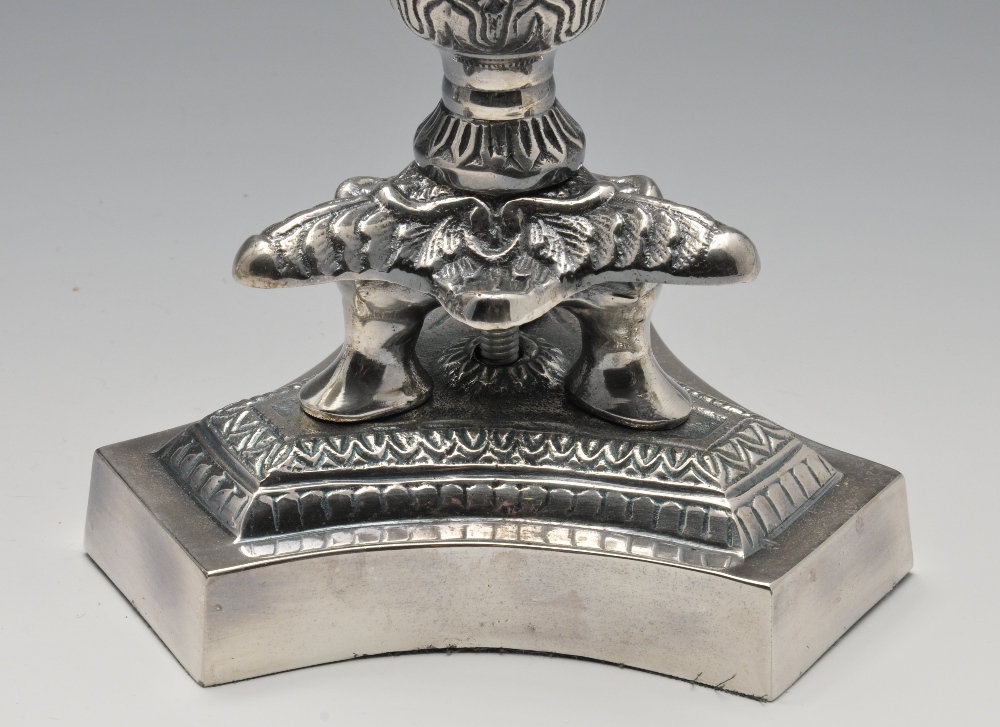 A pair of modern silver plated candelabra of Empire style, the tri-form base rising to the foliate - Image 2 of 4