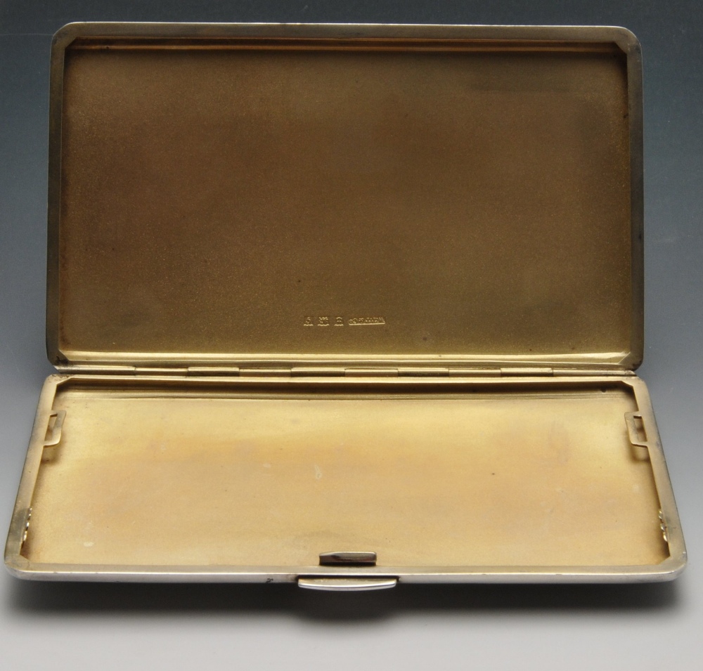 A mid-twentieth century silver cigarette case of rounded rectangular form, having stepped sides, - Image 2 of 11