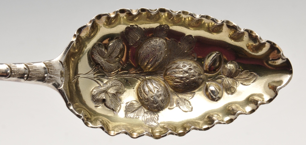 A pair of George III silver berry spoons, the silver-gilt fruiting embossed bowls with frilled - Image 3 of 6