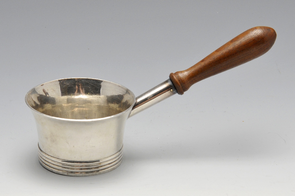 A mid-eighteenth century Channel Islands silver brandy pan, of tapering circular form with