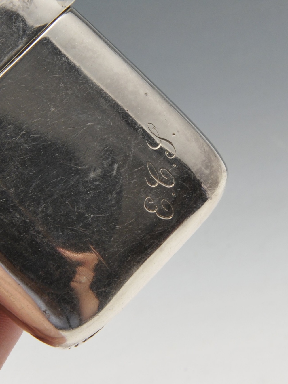 An Edwardian silver vesta case of plain oblong form with engraved family crest to the front, - Image 3 of 7