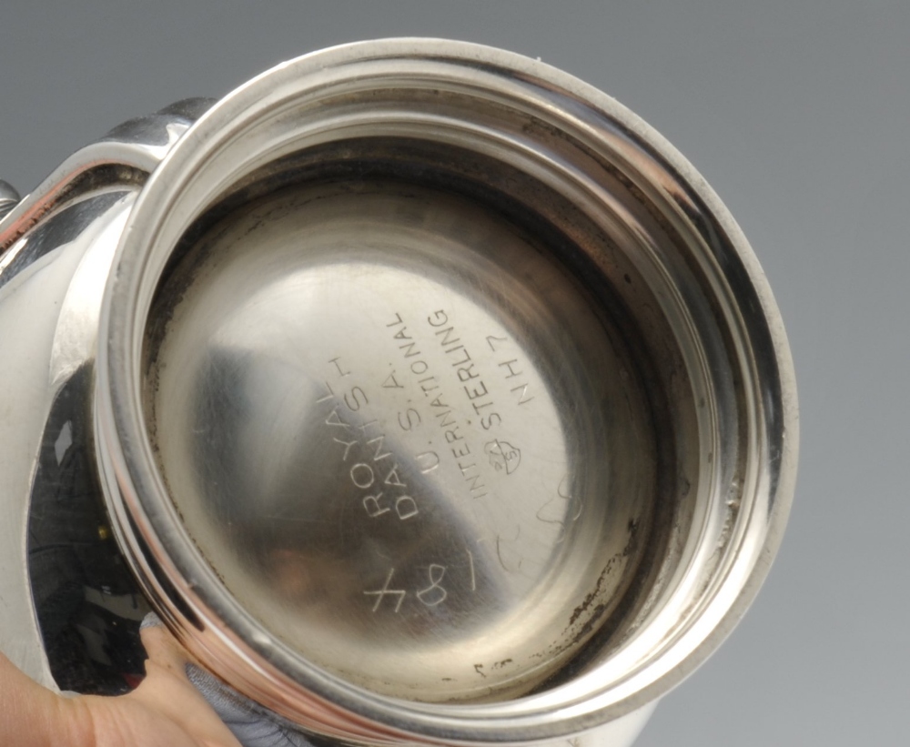 A pair of small German silver cream jugs with embossed panelled decoration, German assay marks for - Image 5 of 9