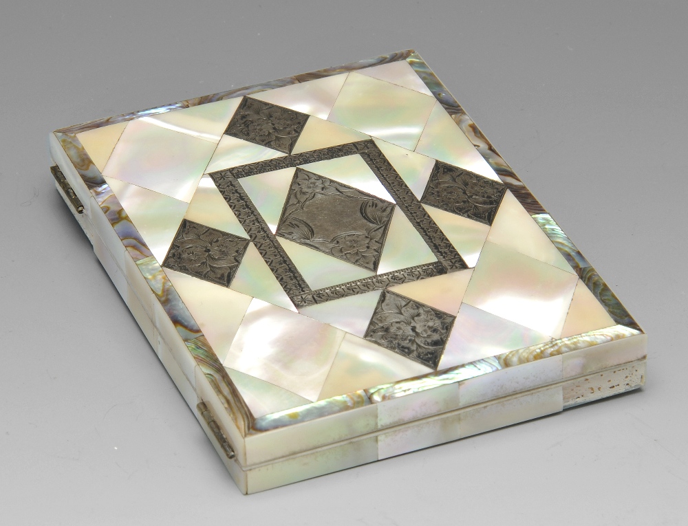 A mother-of-pearl mounted visiting card case, having lozenge panels with florally engraved metal