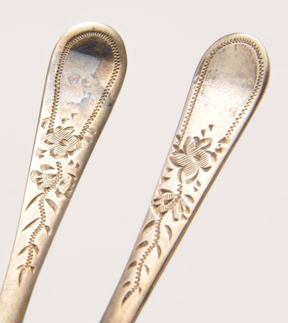A cased set of six George V silver spoons and sugar tongs, each having floral engraving to the stem. - Image 3 of 4