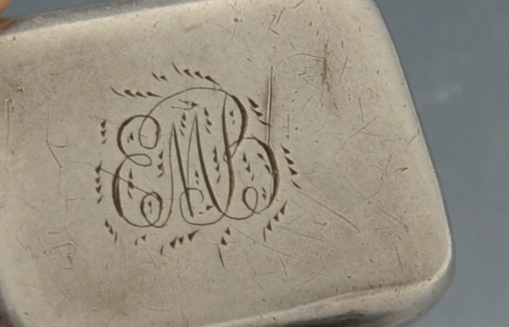 A George III silver vinaigrette, the small plain oblong form with initial engraving opening to a - Image 4 of 4