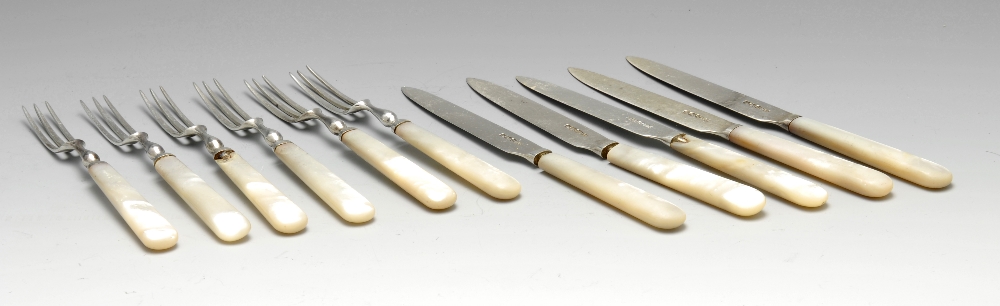 A selection of various early twentieth century mother-of-pearl handled silver fruit knives and