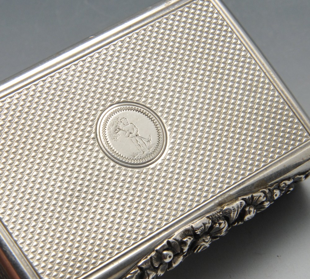 A George IV silver snuff box, the oblong form with engine-turned decoration, crested circular - Image 5 of 5