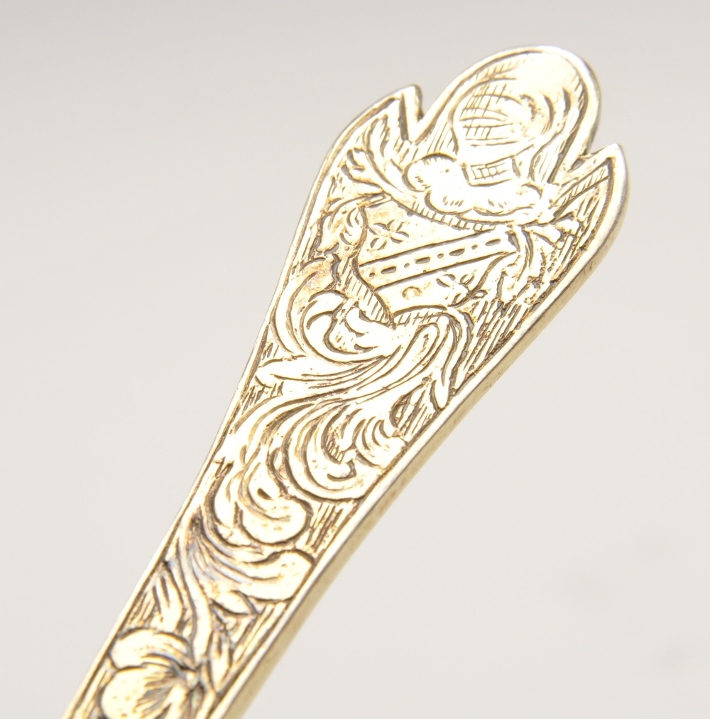 An Edwardian imported replica silver-gilt Trefid spoon with foliate engraved stem with stylised - Image 5 of 8